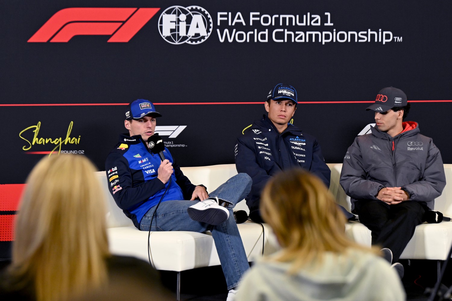 Max Verstappen of the Netherlands and Oracle Red Bull Racing, Alexander Albon of Thailand and Williams and Gabriel Bortoleto of Brazil and Audi F1 Team attend the Drivers Press Conference during previews ahead of the F1 Grand Prix of China at Shanghai International Circuit on March 12, 2026 in Shanghai, China. (Photo by Sam Bagnall/Sutton Images) // Getty Images / Red Bull Content Pool //
