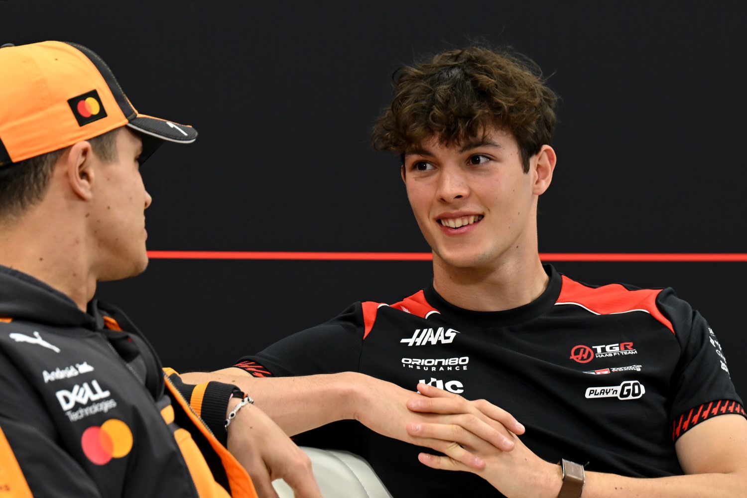 Lando Norris of Great Britain and McLaren and Oliver Bearman of Great Britain and Haas F1 talk in the Drivers Press Conference during previews ahead of the F1 Grand Prix of Japan at Suzuka Circuit on March 26, 2026 in Suzuka, Japan. (Photo by Sam Bagnall/Sutton Images for Haas)