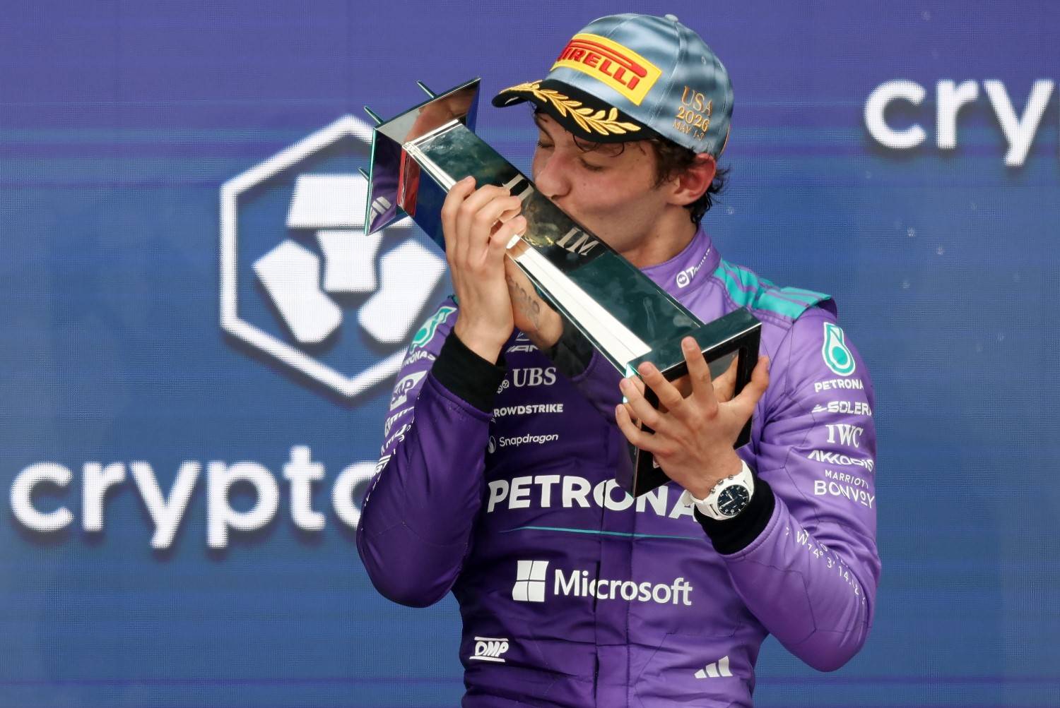 Race winner Andrea Kimi Antonelli of Italy and Mercedes AMG Petronas F1 Team kisses his trophy on the podium during the F1 Grand Prix of Miami at Miami International Autodrome on May 03, 2026 in Miami, Florida. (Photo by Chris Graythen/Getty Images for Mercedes)