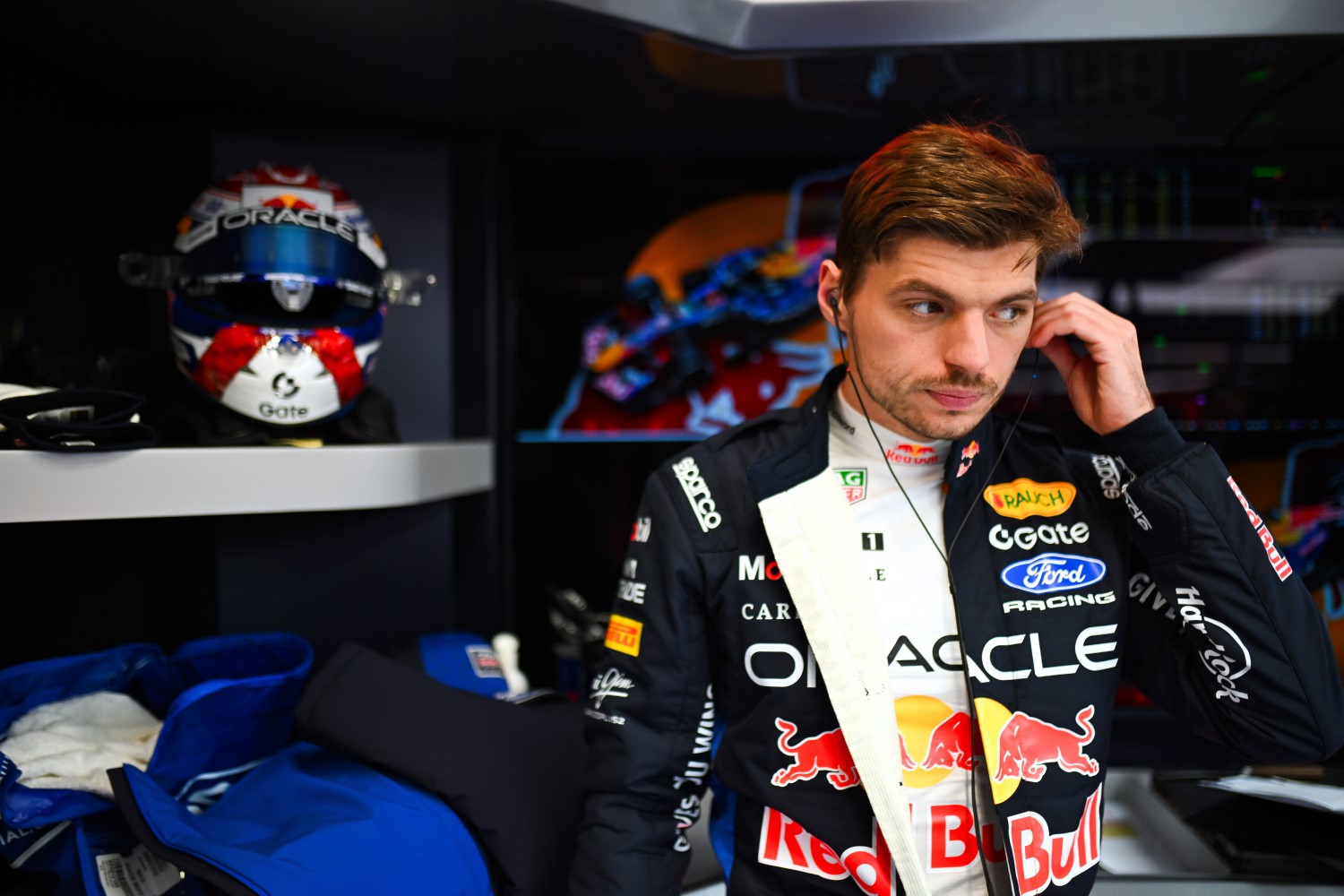 Max Verstappen of the Netherlands and Oracle Red Bull Racing adjusts his earplugs during day five of F1 Shakedown at Circuit de Catalunya on January 30, 2026 in Montmelo, Spain. (Photo by Rudy Carezzevoli/Getty Images) // Getty Images for Red Bull