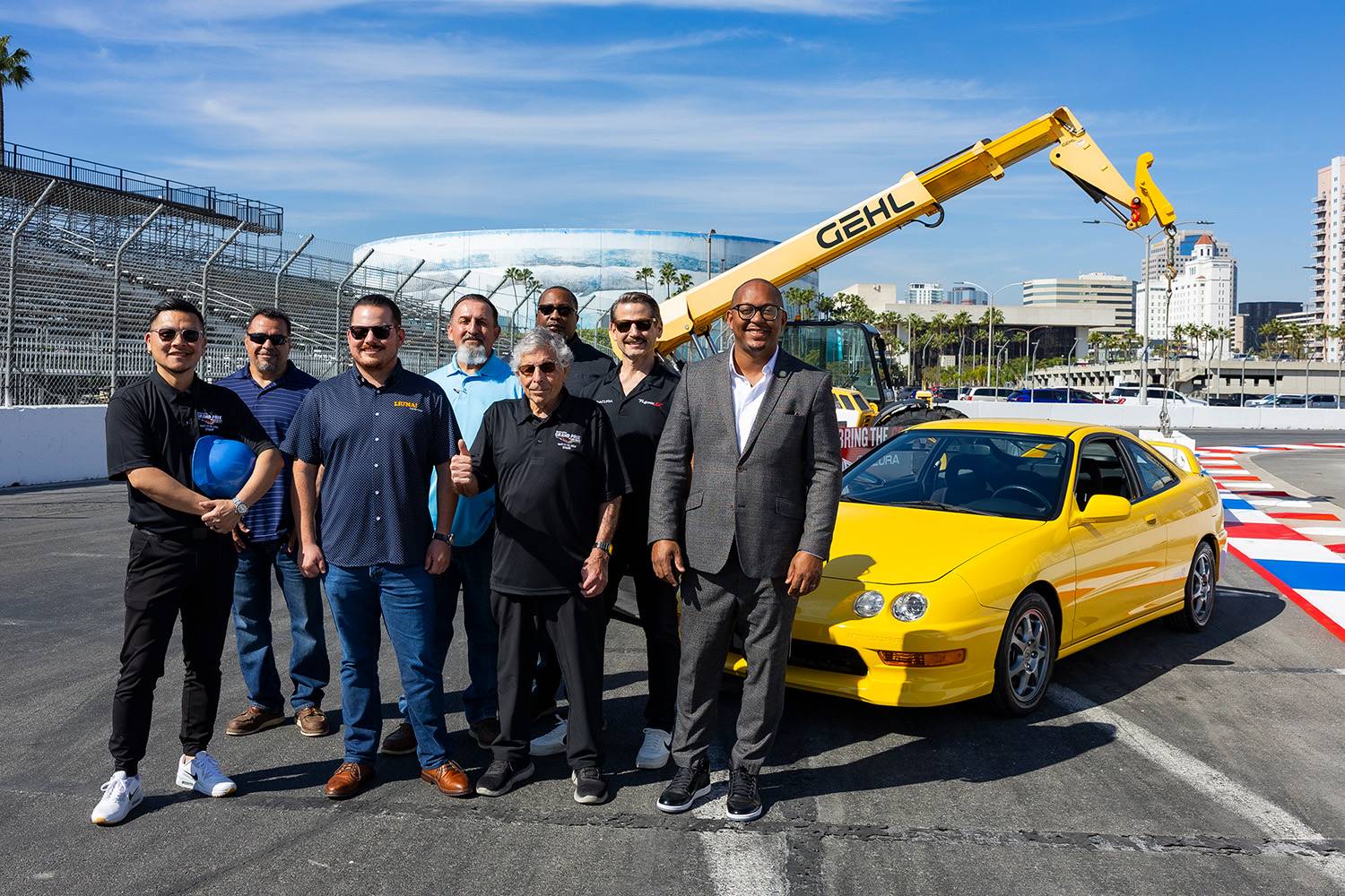 Helping to kick off the Acura Grand Prix of Long Beach track construction were, left to right: Jim Liaw, Acura Grand Prix General Manager; Eddie Rivera, Nick Santos, Steve Mendoza and Henry Thomas from LiUNA Local 1309; Jim Michaelian, Acura Grand Prix President & CEO; Todd Knepp, Acura Manager of Acura Regional Marketing, and Long Beach Mayor Rex Richardson. Credit: Liezl Estipona/City of Long Beach.