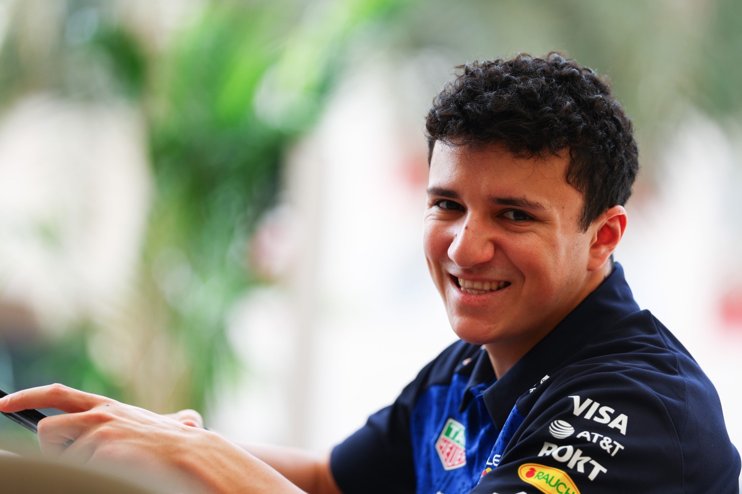 Isack Hadjar of France and Oracle Red Bull Racing looks on during day two of F1 Testing at Bahrain International Circuit on February 12, 2026 in Bahrain, Bahrain. (Photo by Mark Thompson/Getty Images) // Getty Images / Red Bull Content Pool //