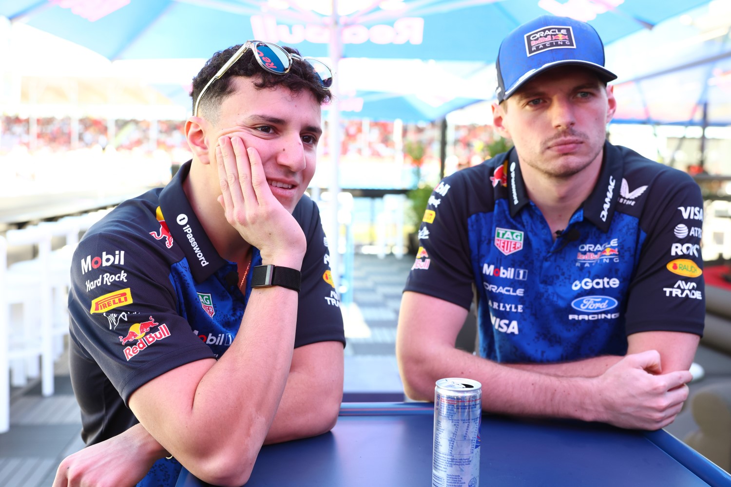 Isack Hadjar of France and Oracle Red Bull Racing and Max Verstappen of the Netherlands and Oracle Red Bull Racing look on in the Paddock during previews ahead of the F1 Grand Prix of Australia at Albert Park Grand Prix Circuit on March 05, 2026 in Melbourne, Australia. (Photo by Mark Thompson/Getty Images) // Getty Images / Red Bull Content Pool //