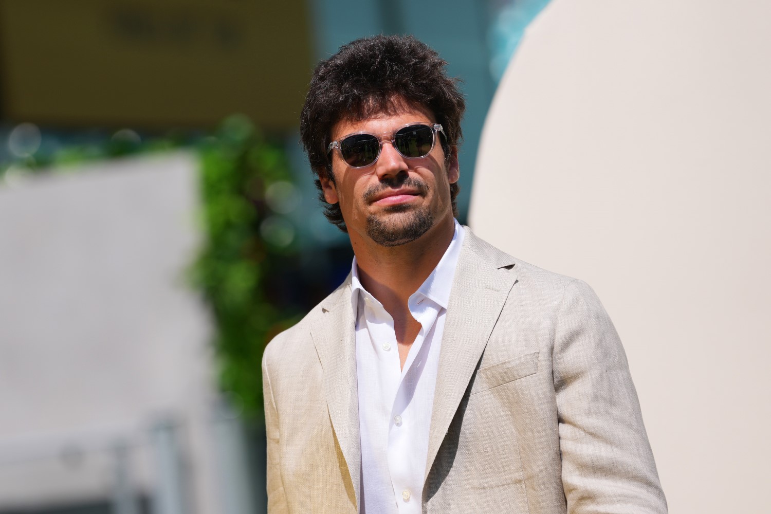 Lance Stroll of Canada and Aston Martin F1 Team arrives in the Paddock during previews ahead of the F1 Grand Prix of Miami at Miami International Autodrome on April 30, 2026 in Miami, Florida. (Photo by Sona Maleterova/LAT Images for Aston Martin)