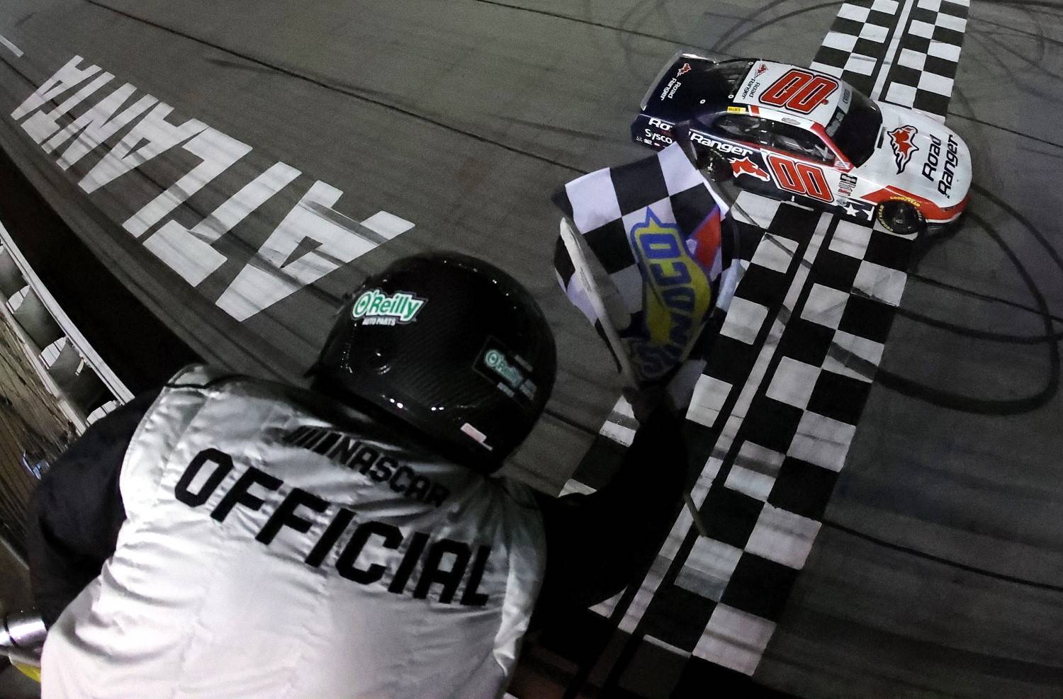 Sheldon Creed, driver of the #00 Road Ranger Chevrolet, takes the checkered flag to win the NASCAR O'Reilly Auto Parts Series Bennett Transportation & Logistics 250 at Echo Park Speedway on February 21, 2026 in Hampton, Georgia. (Photo by Jonathan Bachman/Getty Images)