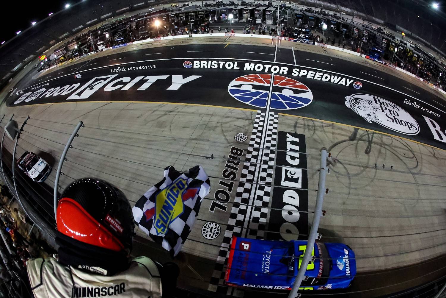 Christopher Bell, driver of the #62 Halmar Infrastructure Development Toyota, takes the checkered flag to win the NASCAR Craftsman Truck Series Tennessee Army National Guard 250 at Bristol Motor Speedway on April 10, 2026 in Bristol, Tennessee. (Photo by Jonathan Bachman/Getty Images)