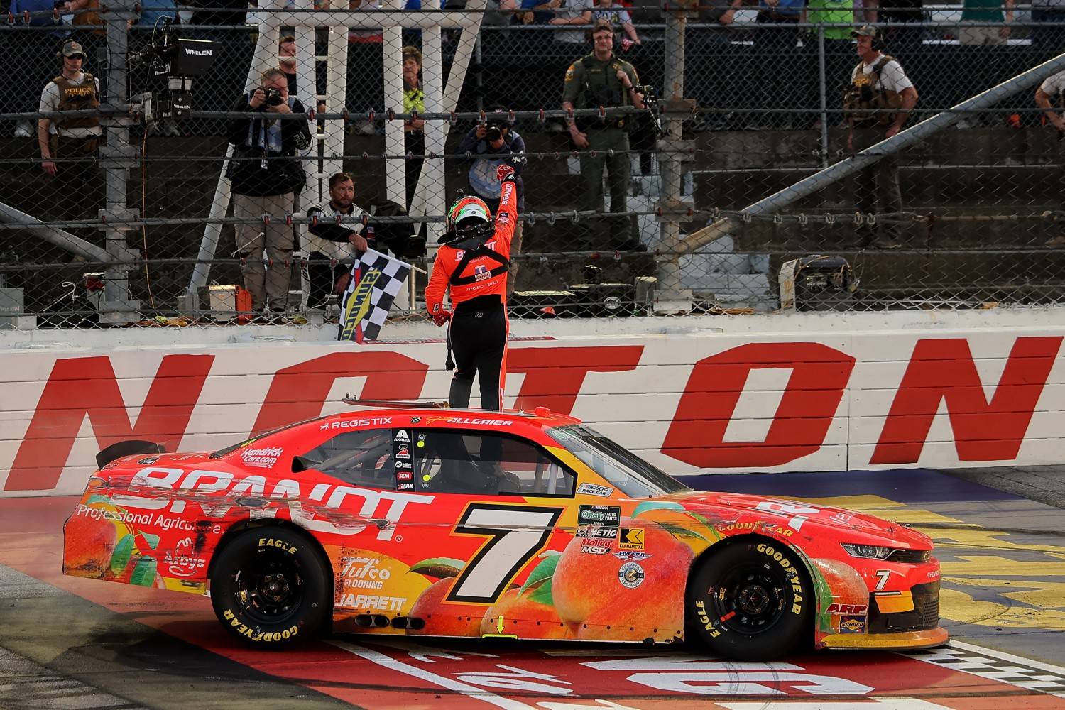 Justin Allgaier, driver of the #7 BRANDT Chevrolet, celebrates in victory lane after winning the NASCAR O'Reilly Auto Parts Series Sport Clips Haircuts VFW Help a Hero 200 at Darlington Raceway on March 21, 2026 in Darlington, South Carolina. (Photo by Jonathan Bachman/Getty Images)