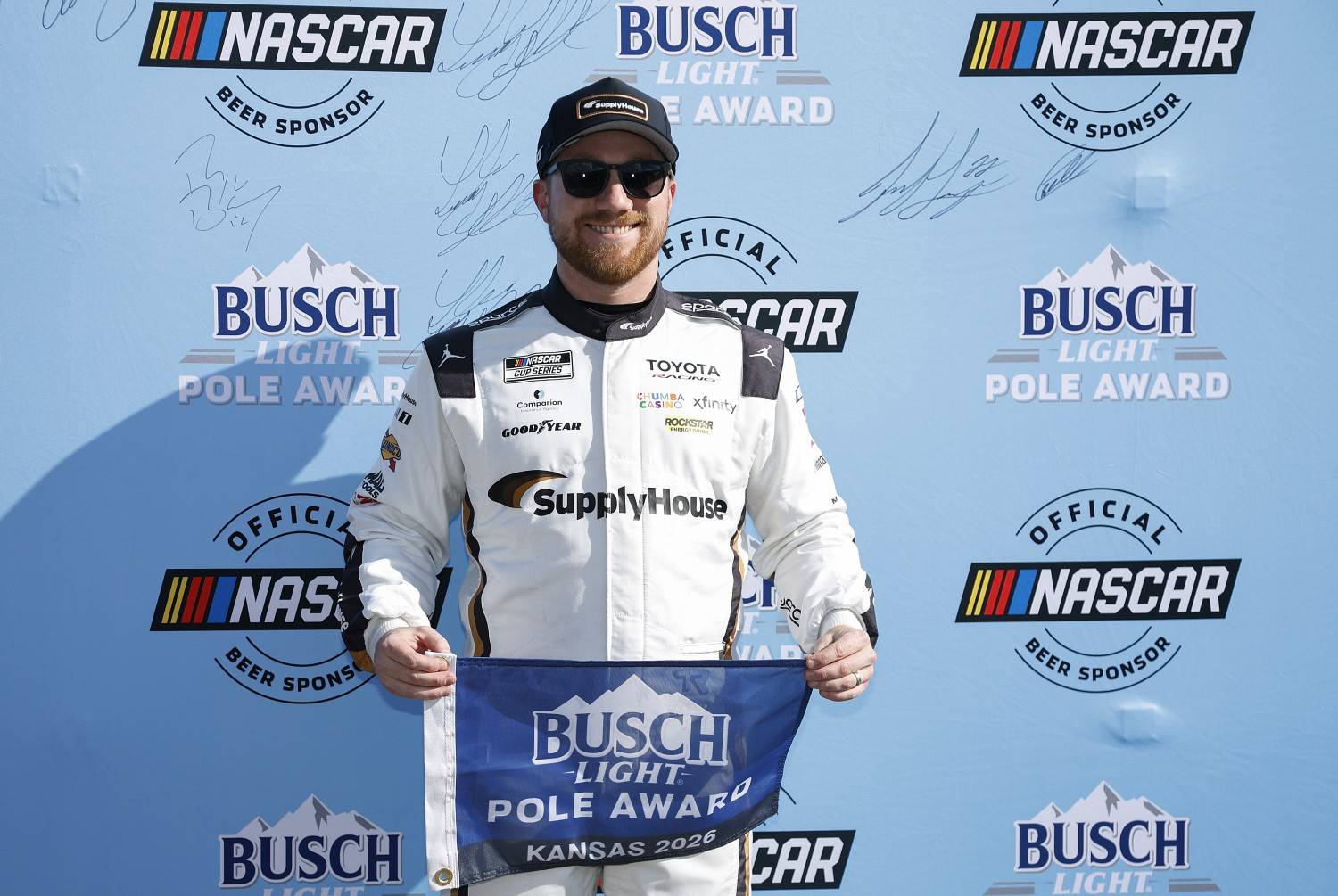 Tyler Reddick, driver of the #45 Supply House Toyota, poses for photos after winning the pole award during qualifying for the NASCAR Cup Series AdventHealth 400 at Kansas Speedway on April 18, 2026 in Kansas City, Kansas. (Photo by Sean Gardner/Getty Images)