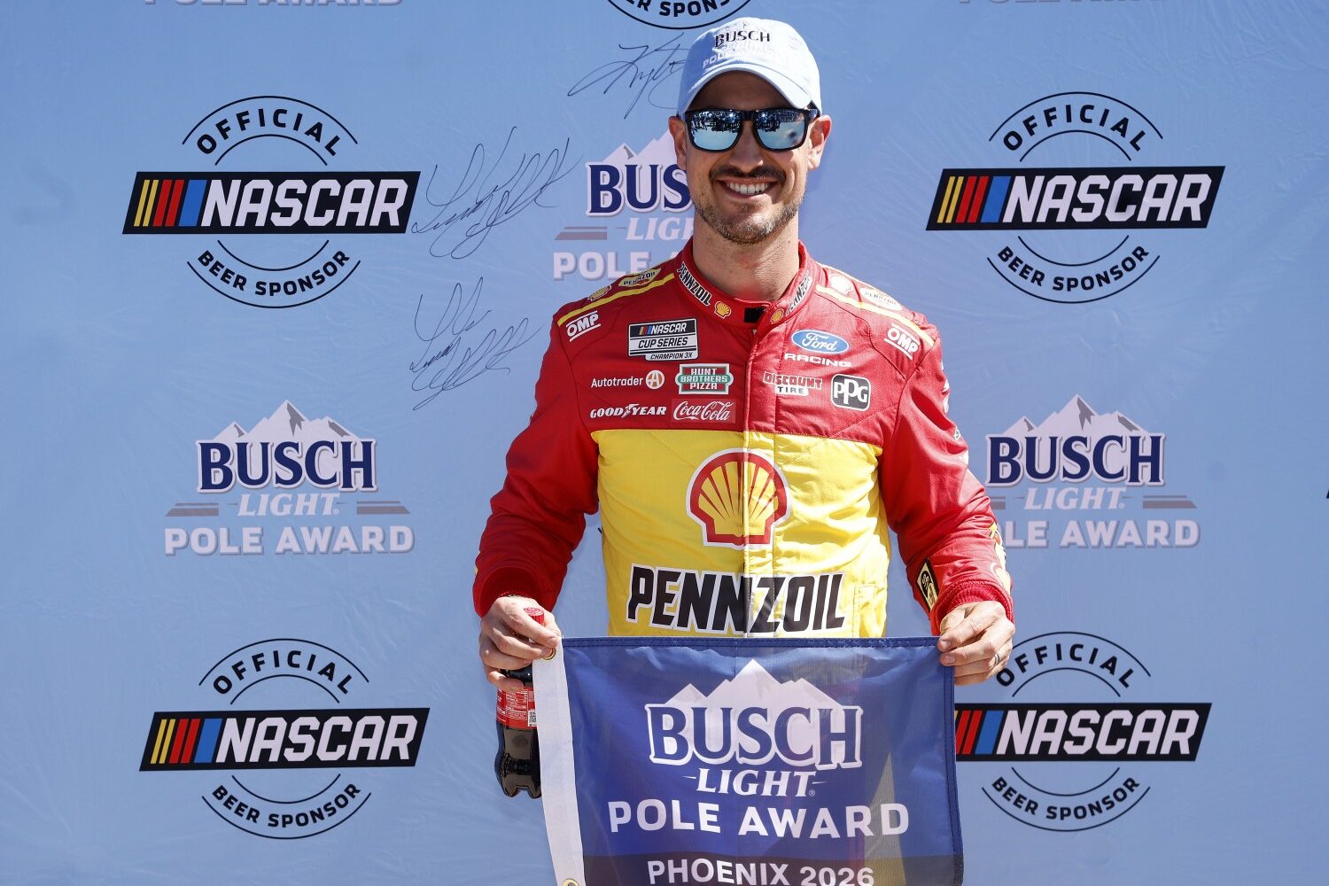 Joey Logano, driver of the #22 Shell Pennzoil Ford, poses for photos after winning the pole award during qualifying for the NASCAR Cup Series Straight Talk Wireless 500 at Phoenix Raceway on March 07, 2026 in Avondale, Arizona. (Photo by Sean Gardner/Getty Images)