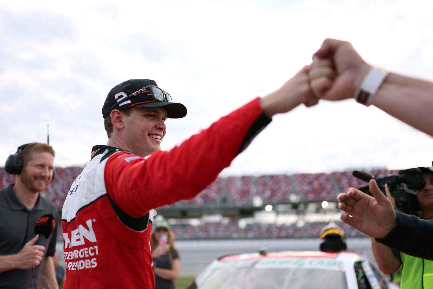 Jesse Love, driver of the #2 Whelen Chevrolet, celebrates after winning the pole award during qualifying for the NASCAR O'Reilly Auto Parts Series Ag-Pro 300 at Talladega Superspeedway on April 24, 2026 in Talladega, Alabama. (Photo by David Jensen/Getty Images for NASCAR)
