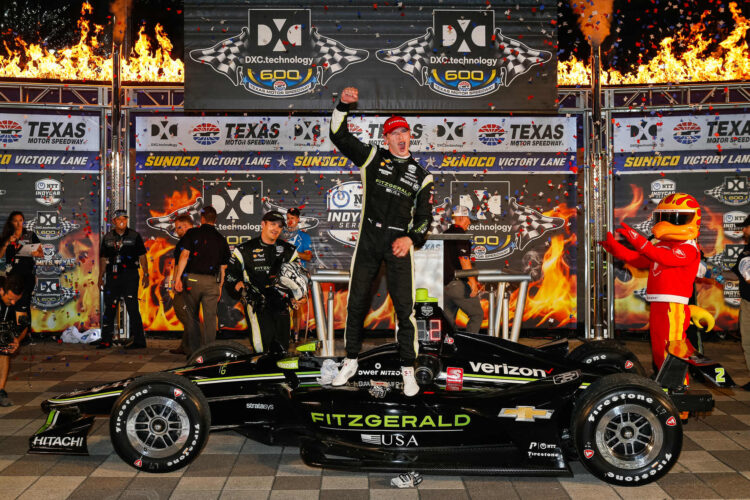 Newgarden holds off Rossi to win in Texas