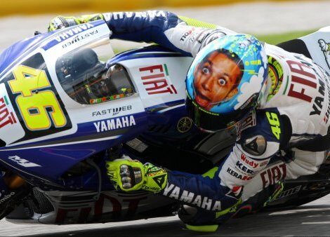 Rossi wins pole for home GP