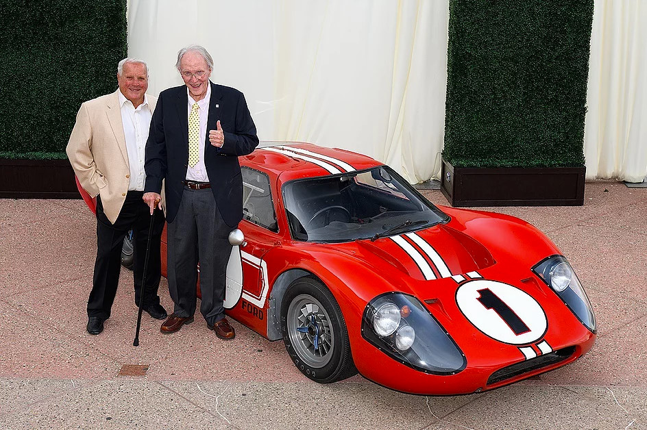 A.J. and Dan pose with their Ford Mk II--reunited after 50 years.  (Photo courtesy  of Ford Performance)