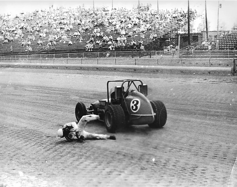 On fire from a refueling accident at DuQuoin, Foyt leapt from car which then ran over his leg and broke it. 
