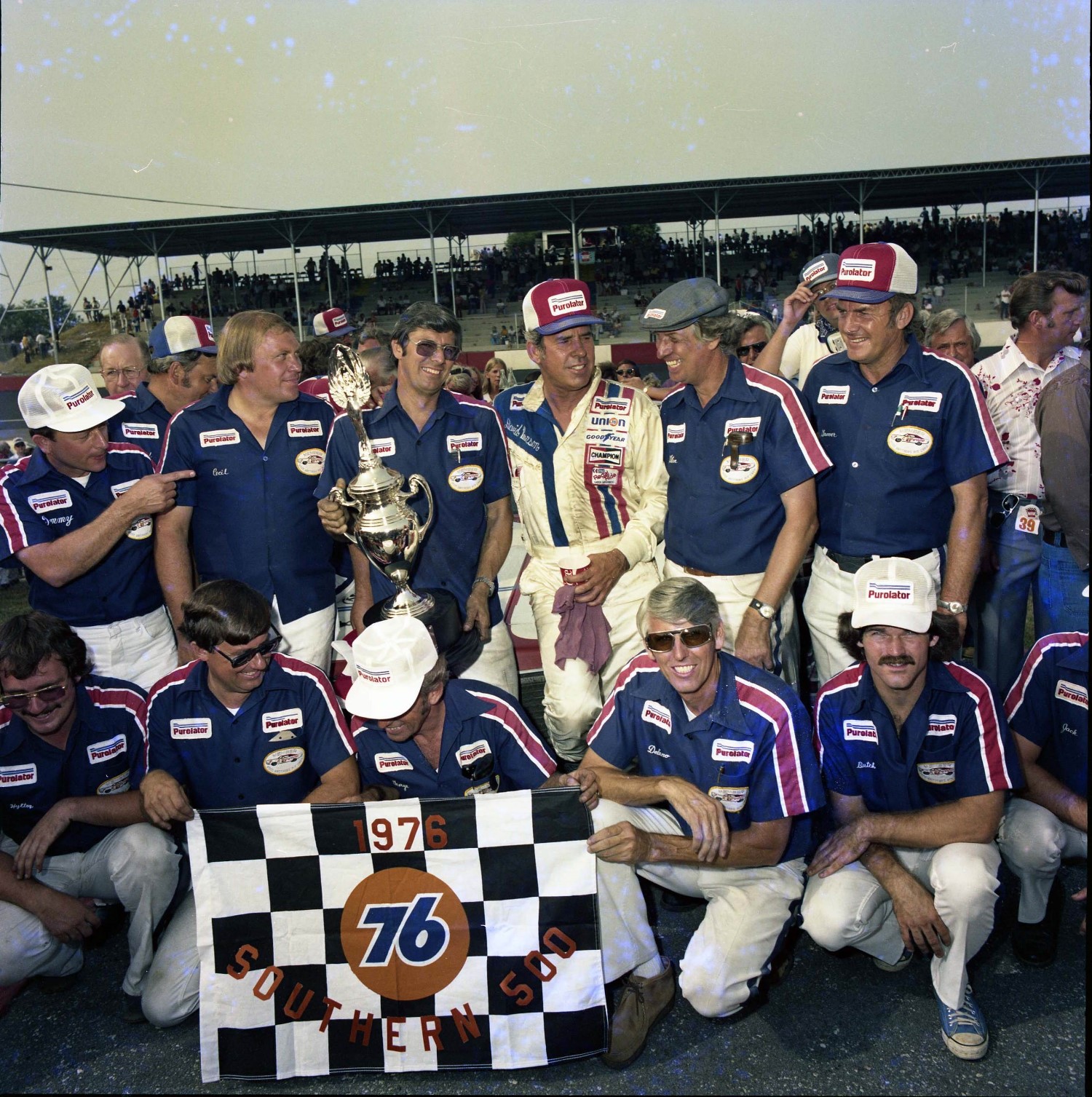 The Wood Brothers and Pearson celebrate their 1976 Southern 500 win