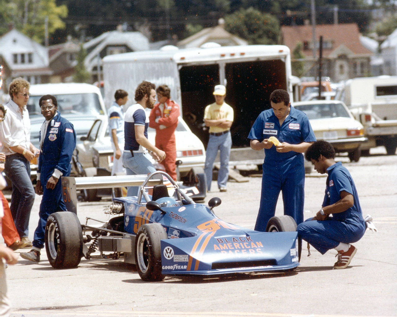 Tommy Thompson walks behind his car at Milwaukee. A week later he would be killed at Trenton. Oh what might have been.