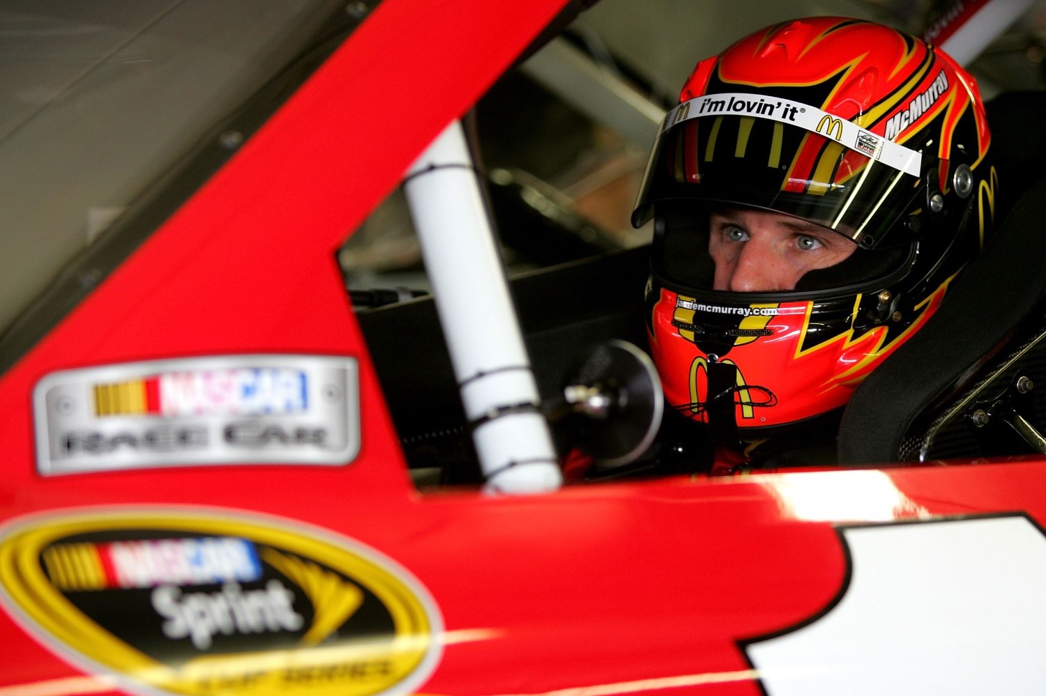 Jamie McMurray, driver of the #1 McDonald's Chevrolet, sits in his car during practice for the NASCAR Sprint Cup Series Sylvania 300 at New Hampshire Motor Speedway on September 18, 2010 in Loudon, New Hampshire. (Photo by Jerry Markland/Getty Images for NASCAR)