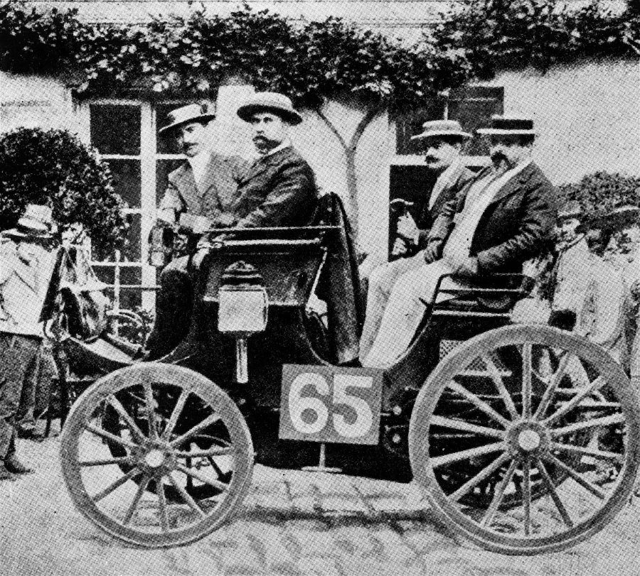 First competitive motorcar race from Paris to Rouen, 22 July 1894. The Peugeot belonging to Albert LemaÃ®tre (starting number 65), on the left rear seat Adolphe Clément. This Peugeot with an engine produced under a Daimler licence crossed the finishing line in second place but was the first car over the line with a combustion engine and was awarded the joint first prize.