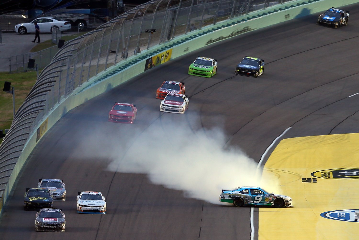 Corey Lajoie, driver of the #9 Victory Junction Chevrolet, is involved in an incident during the NASCAR Nationwide Series Ford EcoBoost 300 at Homestead-Miami Speedway on November 16, 2013 in Homestead, Florida. (Photo by Mike Ehrmann/Getty Images)