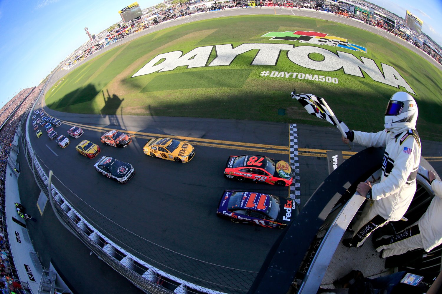 Truex wins by inches